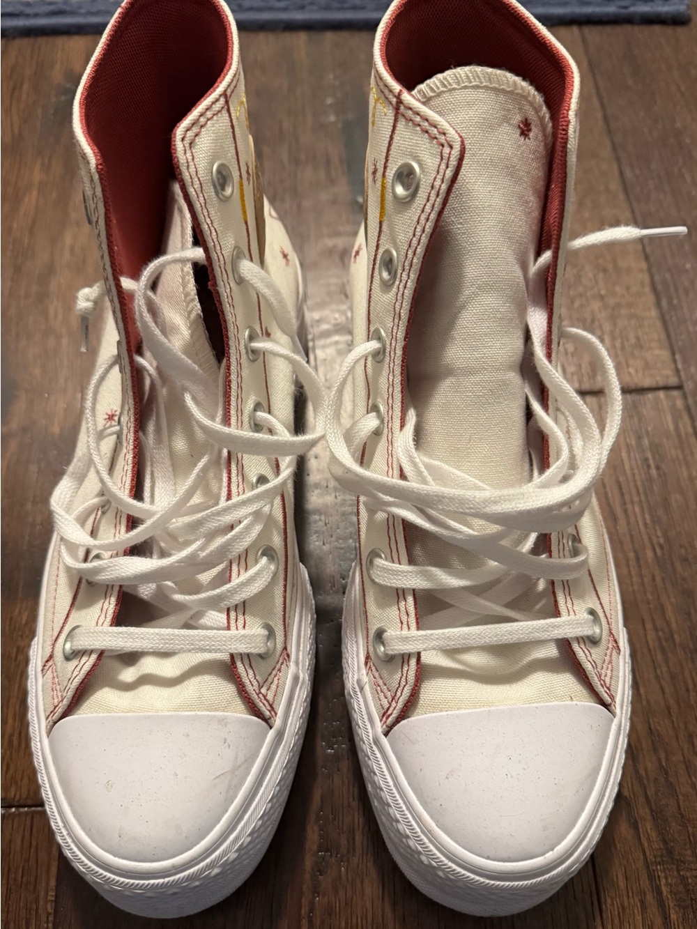 Converse Cream High-Top Sneakers with Red Trim